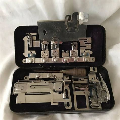 antique new home sewing machine attachments in metal box|Metal Sewing Machine Attachments in Box .